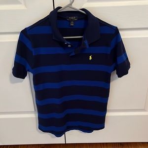 Blue short sleeve polo shirt. Slightly used no signs of wear. Youth large.